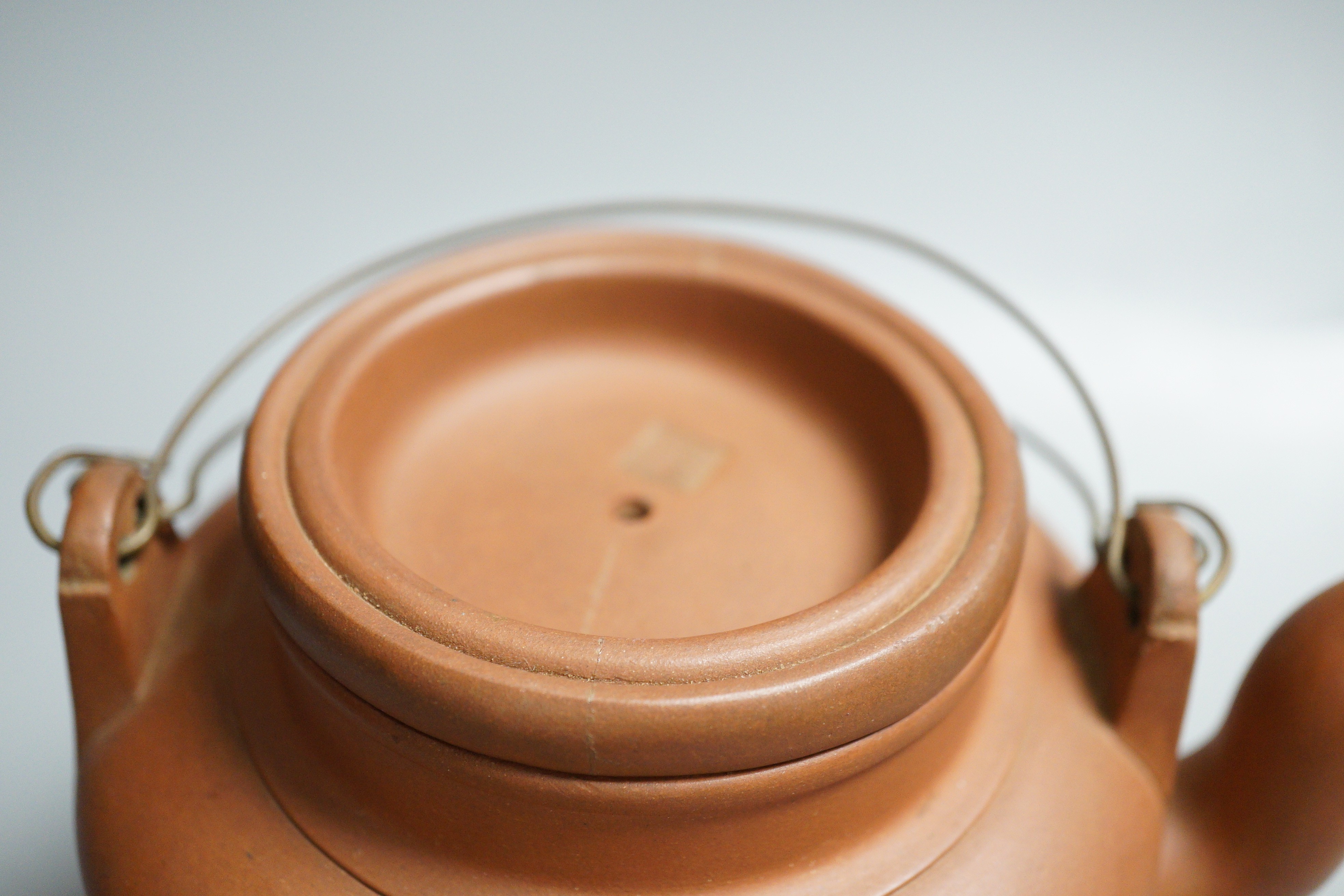 Two Chinese Yixing teapots and two similar teabowls. Tallest 14cm